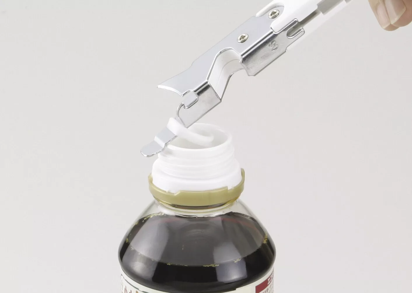 KAI DH8136 Wielofunkcyjny otwieracz 4w1 do puszek i butelek, 15 cm